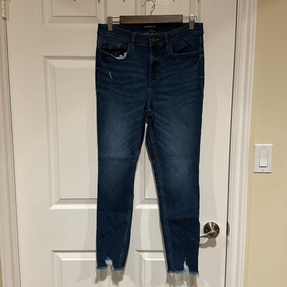 Calvin Klein distressed hem skinny jeans